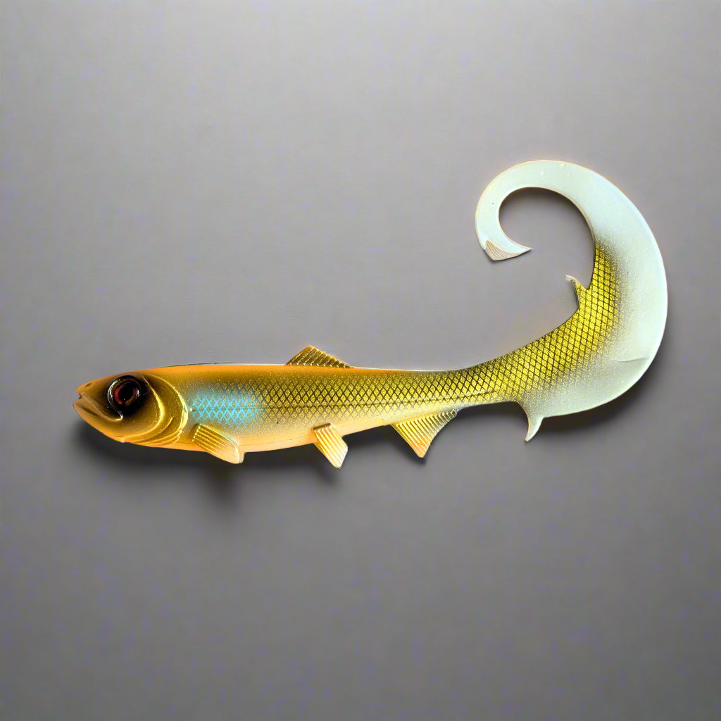 Overview of a gold and white fishing lure with a curl tail