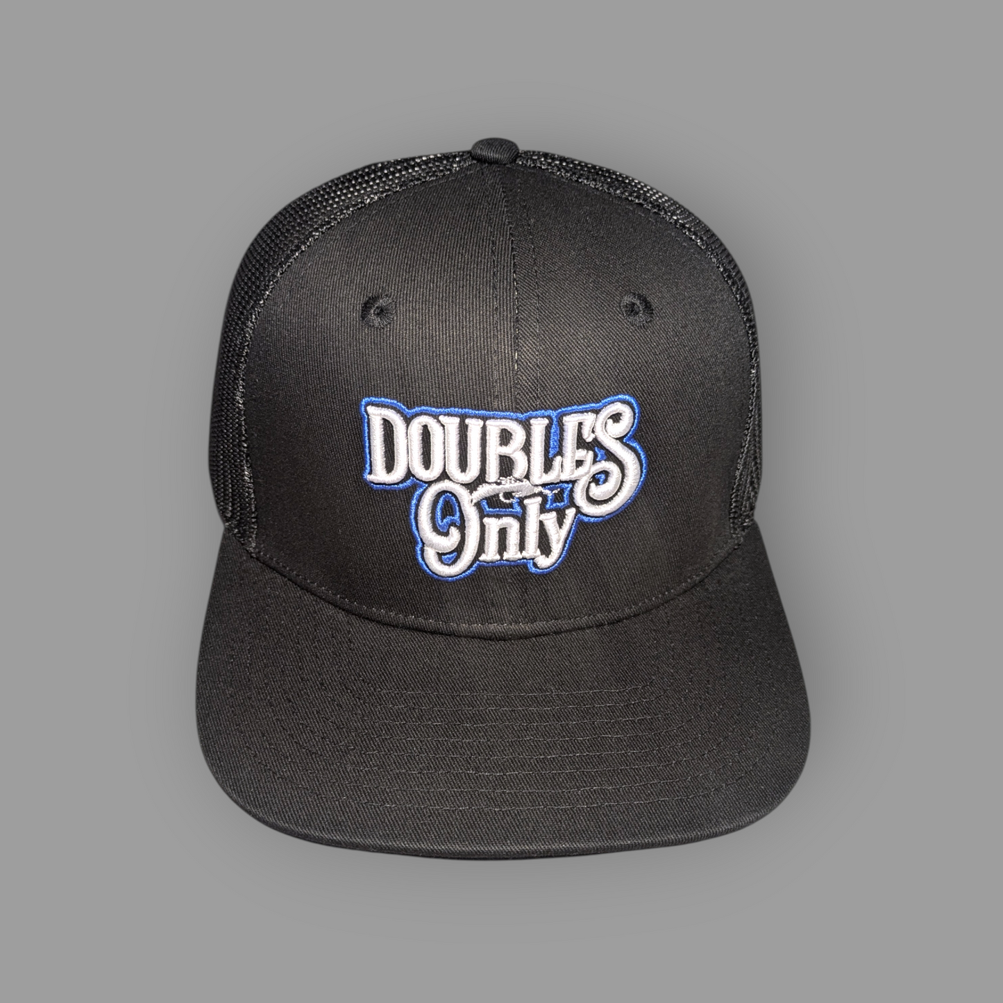 Black cap with 'DOUBLES ONLY' text on a gray background