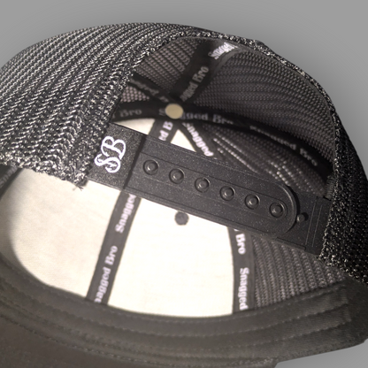 Black mesh cap with brand logo on a gray background
