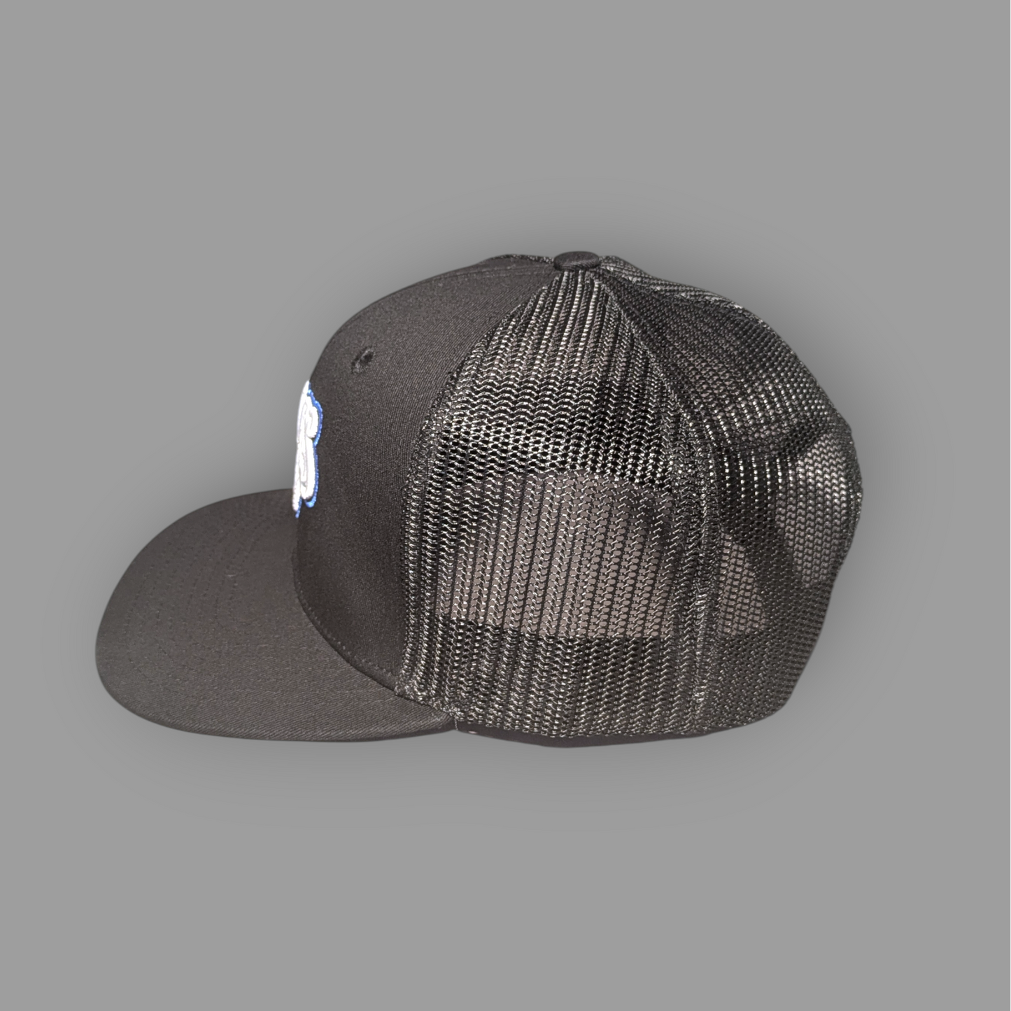 Black mesh cap on a gray background