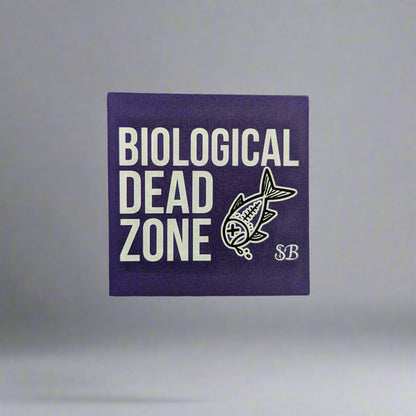 Square purple sticker with 'Dead Zone' text and fish icon on a white background