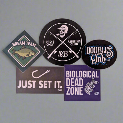 Collection of fishing-themed stickers on a yellow background