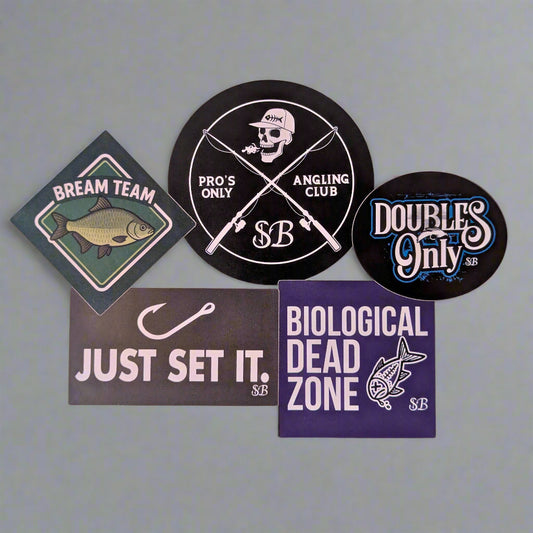 Collection of fishing-themed stickers on a yellow background