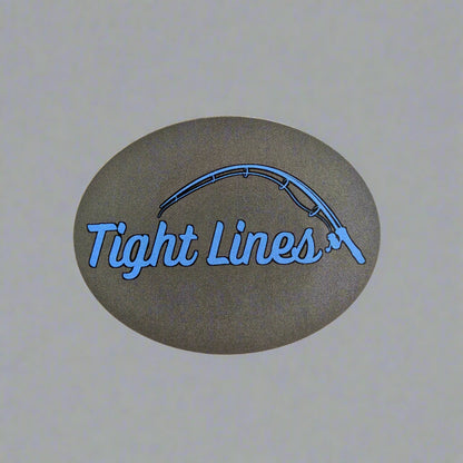 Sticker with 'Tight Lines' text and fishing rod graphic on a gray background